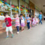 Students practice walking in a line during a preschool program at Marshall Elementary